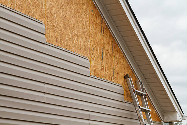 Professional Siding Contractor technician working in Kathleen, FL